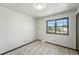 Light-filled bedroom with carpet and a window offering outdoor views at 1354 S Macon St, Aurora, CO 80012