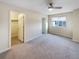 Spacious bedroom with large window and ceiling fan at 11267 Central Ct, Broomfield, CO 80021