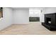 Finished basement with a fireplace and built-in wet bar at 3930 S Hillcrest Dr, Denver, CO 80237