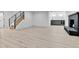 Finished basement with modern staircase and wet bar area at 3930 S Hillcrest Dr, Denver, CO 80237
