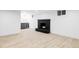 Basement features a fireplace and a bar area with a wine fridge at 3930 S Hillcrest Dr, Denver, CO 80237