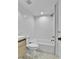 Bathroom features a tile shower and modern fixtures at 3930 S Hillcrest Dr, Denver, CO 80237