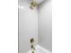 Modern shower with a rain shower head and grey and white tiles at 3930 S Hillcrest Dr, Denver, CO 80237