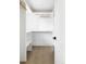 Walk-in closet featuring custom shelving and ample storage space at 3930 S Hillcrest Dr, Denver, CO 80237