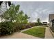 Spacious backyard with lush greenery, mature trees, and a charming bench at 22400 County Road 10, Hudson, CO 80642