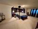 Serene bedroom with a canopy bed and dark curtains at 22400 County Road 10, Hudson, CO 80642