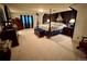 Spacious bedroom featuring a canopy bed and matching furniture at 22400 County Road 10, Hudson, CO 80642