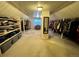 Large walk-in closet with ample storage space and organization at 22400 County Road 10, Hudson, CO 80642