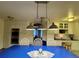 Bright dining area with a table, chairs, and view into the kitchen at 22400 County Road 10, Hudson, CO 80642