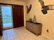 Inviting entryway with tile flooring and decorative console table at 22400 County Road 10, Hudson, CO 80642