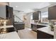 Modern kitchen with stainless steel appliances, sleek cabinets, and ample counter space at 3680 S Logan St, Englewood, CO 80113