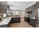 Bright kitchen with modern appliances, sleek cabinets, and stylish backsplash at 3680 S Logan St, Englewood, CO 80113