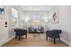 Beautiful living room with hardwood floors, stylish decor, and lots of natural light at 3680 S Logan St, Englewood, CO 80113