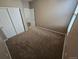 Carpeted bedroom with a closet and great natural light at 1927 Rannoch Dr, Longmont, CO 80504