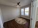 Cozy bedroom with hardwood floors, neutral walls, and natural light at 1927 Rannoch Dr, Longmont, CO 80504