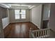 Bright dining room showcasing hardwood floors and recessed lighting at 1927 Rannoch Dr, Longmont, CO 80504
