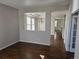 Cozy living room showing a glimpse of the dining room and stairs at 1927 Rannoch Dr, Longmont, CO 80504