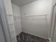 Walk-in closet with wire shelving and carpet flooring at 1927 Rannoch Dr, Longmont, CO 80504