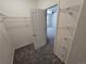Well-organized walk-in closet with ample storage space and natural light at 1927 Rannoch Dr, Longmont, CO 80504