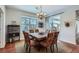 Formal dining room with seating for six, chandelier lighting, and neutral decor at 2272 Front Range Rd, Erie, CO 80516
