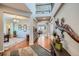 Grand foyer with hardwood floors, high ceilings, and decorative accents at 2272 Front Range Rd, Erie, CO 80516