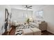 Comfortable living room with hardwood floors, a modern sofa and a stylish area rug, creating a relaxing space at 1680 Syracuse St, Denver, CO 80220