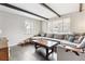 Comfortable living room with hardwood floors and beamed ceiling at 217 Ford St, Golden, CO 80403