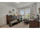 Bedroom featuring a bunk bed with a built-in play area and bookcase at 18173 E 104Th Way, Commerce City, CO 80022