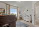 Bright bedroom with a view and a play area at 18173 E 104Th Way, Commerce City, CO 80022