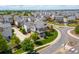 Inviting two-story home with a charming porch, set on a well-manicured lawn in a peaceful neighborhood at 18173 E 104Th Way, Commerce City, CO 80022