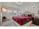 Cozy main bedroom with natural light, a comfortable bed, and modern decor at 18173 E 104Th Way, Commerce City, CO 80022