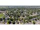Aerial view of the neighborhood featuring tree-lined streets and nearby amenities at 6240 W 110Th Pl, Westminster, CO 80020