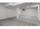 Expansive basement area with structural beam and neutral finishes at 6240 W 110Th Pl, Westminster, CO 80020