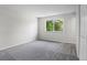Minimalist bedroom with soft gray carpet and an abundance of natural light at 6240 W 110Th Pl, Westminster, CO 80020