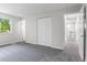 Spacious bedroom with ample closet space and a view to the upstairs landing at 6240 W 110Th Pl, Westminster, CO 80020