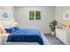 Charming bedroom featuring a plush bed, large window, and stylish white furniture at 6240 W 110Th Pl, Westminster, CO 80020