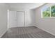 Cozy bedroom featuring plush carpeting and a sunlit window view at 6240 W 110Th Pl, Westminster, CO 80020