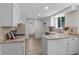 Bright kitchen with new cabinets, granite counters, and stainless appliances at 6240 W 110Th Pl, Westminster, CO 80020