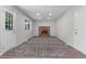 Spacious living room with brick fireplace, new carpet, and natural light at 6240 W 110Th Pl, Westminster, CO 80020
