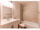 Renovated bathroom features a shower, tub, sink, and updated fixtures at 8798 Chase Dr # 2, Arvada, CO 80003