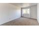 Bedroom with neutral carpet, and a sunlit window at 8798 Chase Dr # 2, Arvada, CO 80003