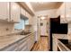 Bright kitchen with stainless steel appliances and marble countertops at 8798 Chase Dr # 2, Arvada, CO 80003