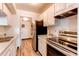 Bright kitchen with stainless steel appliances and marble countertops at 8798 Chase Dr # 2, Arvada, CO 80003