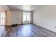 Inviting living room featuring hardwood floors and ample natural light at 8798 Chase Dr # 2, Arvada, CO 80003