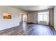 Open-concept living room with hardwood floors and natural light at 8798 Chase Dr # 2, Arvada, CO 80003