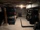 Well-maintained basement with clean flooring and shelving units for organized storage solutions at 6970 Upham St, Arvada, CO 80003