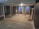 Spacious basement area features a brick fireplace, window and grey walls at 17900 E Asbury Dr, Aurora, CO 80013