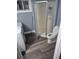 Bright bathroom area with a toilet and shower at 17900 E Asbury Dr, Aurora, CO 80013