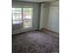 Bedroom featuring window and closet with ample storage space at 17900 E Asbury Dr, Aurora, CO 80013