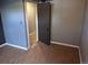 Bedroom featuring a neutral wall color and carpet flooring at 17900 E Asbury Dr, Aurora, CO 80013